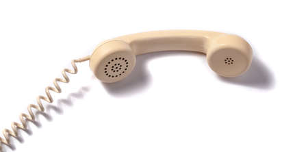Retro handset yellow isolated on white background.の写真素材