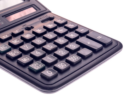 Calculator isolated on white background, device for calculating the numbersの写真素材