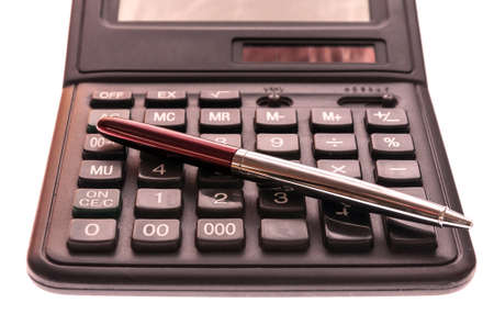 Calculator and pen isolated on white background.の写真素材