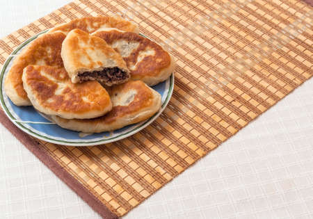 Cooked fried patties in the pan. The patties in the panの写真素材