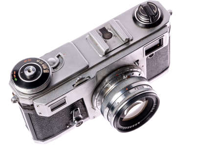 Old camera on isolated white background. Retro cameraの写真素材