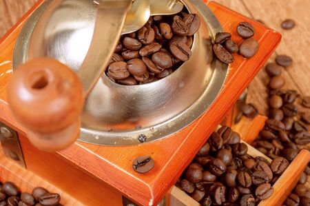 Vintage manual coffee grinder with beans. Retro coffee grinderの写真素材