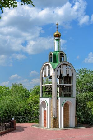 Church of St. Nicholas in the trees on the bank of the river.の写真素材