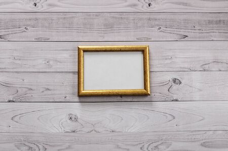 Frame for photography on a light, vintage wooden backgroundの写真素材