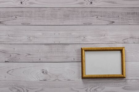 Frame for photography on a light, vintage wooden backgroundの写真素材