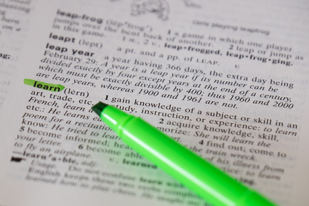 The word learn is highlighted and defined in a dictionary.の写真素材