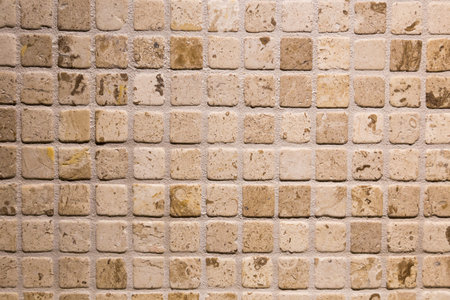 Mosaic stone tile in a shower.