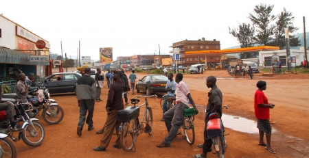 A group of taxi bikes and riders wait on the street in Kabale, Ugandaのeditorial素材