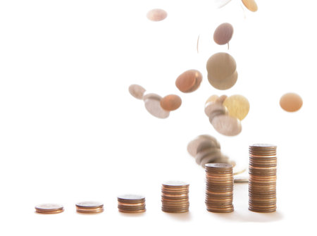 Heap of  coins falling to the ground 