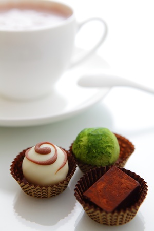 Wonderful tea time with tasty chocolate and hot chocolateの写真素材