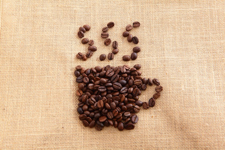 Coffee beans on linen background
