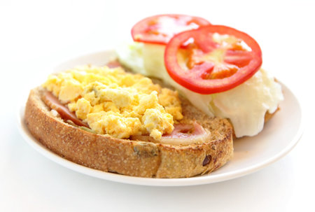 delicious breakfast include egg, tomato , toastの写真素材