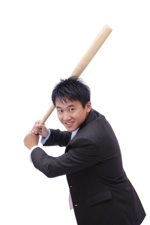 Business man take baseball bat with friendly smile ready for a good hitの写真素材