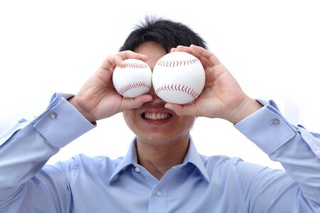 Business Ball take two ball on the faceの写真素材