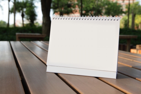 Blank calendar on wood tableの写真素材