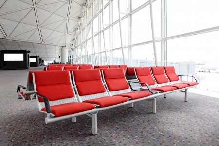 row of red chair at airport, shot in asiaの写真素材