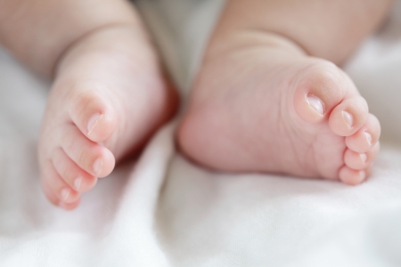 cute Little baby feet toe close upの写真素材