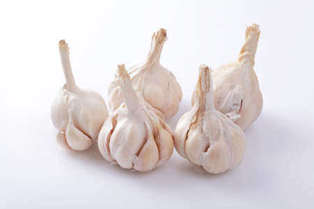 Fresh garlic on kitchen tableの写真素材