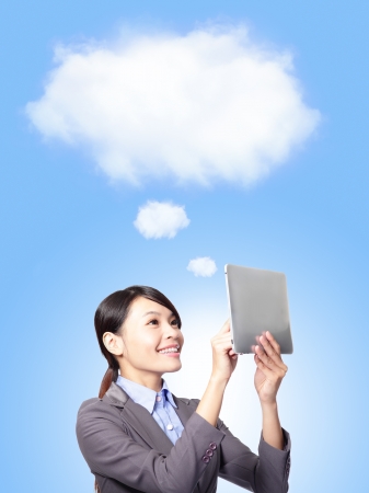 Cloud computing concept and business network. Businesswoman works with tablet pc, asian modelの写真素材