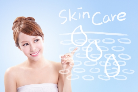 Beauty young woman showing Skin Care and moisturize Concept, asian beautyの写真素材