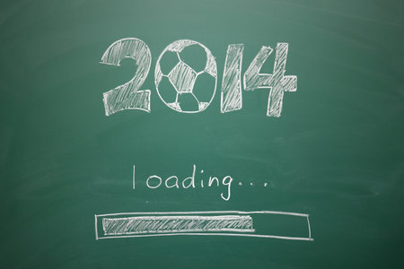 Soccer with 2014 year concept, writing on blackboardの写真素材