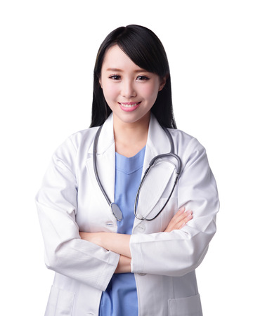 Smiling medical doctor woman with stethoscope. Isolated over white background. asianの写真素材