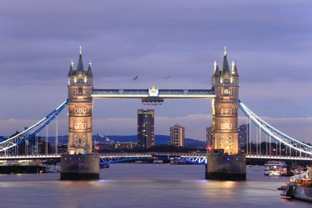 Tower Bridge with reflections in the thames river at sunset in London, United Kingdom, Englandのeditorial素材