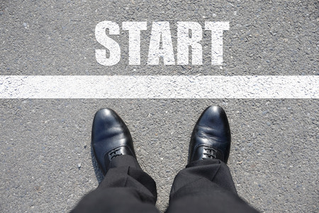 Start - top view of business man walking on the roadの写真素材
