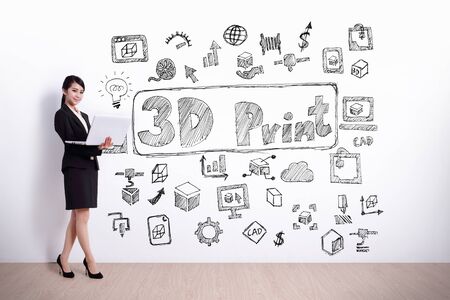 Back view of business woman look hand drawing 3D printer white wall background, asianの写真素材