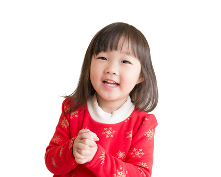 Asian girl with gesture of congratulation isolated on white backgroundの写真素材