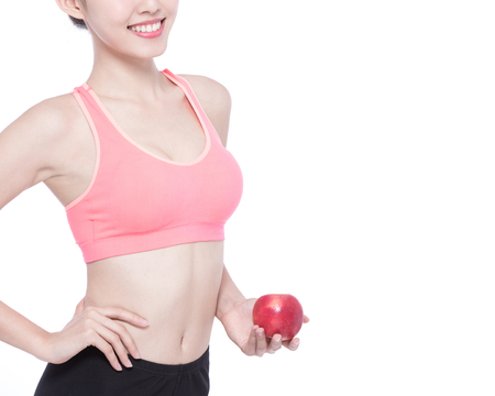 Happy health woman show apple benefit to health, asian beautyの写真素材