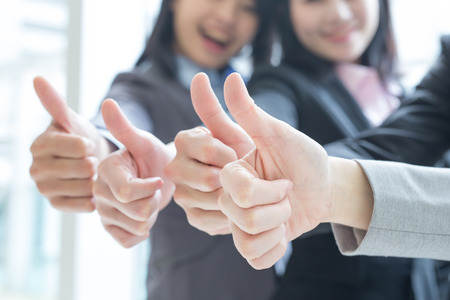 Group of success business people team show thumb up in office, asianの写真素材