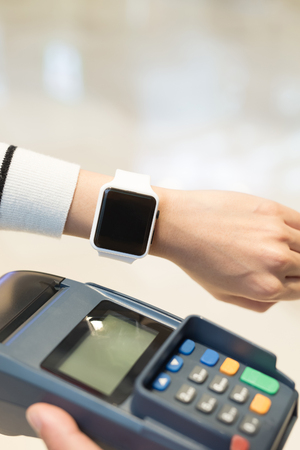 Customer pay by  smart watch with empty screen, great for your designの写真素材