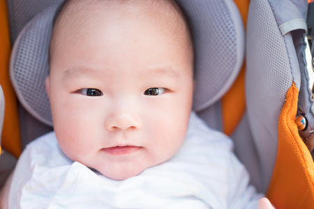 smile face close up of a cute baby , asianの写真素材