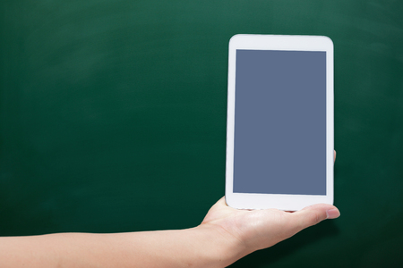 tablet with the blank green chalkboard; great for you designの写真素材
