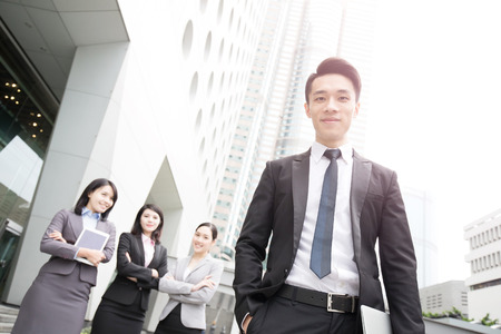 Business people team in the office, shot in Hong Kong, asian woman and manの写真素材
