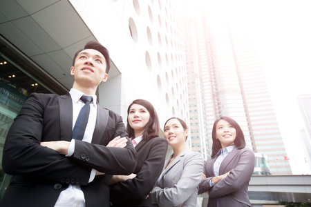 Business people team in the office, shot in Hong Kong, asian woman and manの写真素材