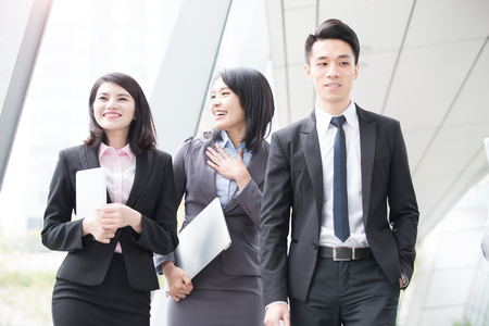 businesspeople talk  in office in hongkongの写真素材