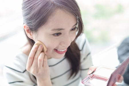 beauty woman make up and smile happily in hongkongの写真素材