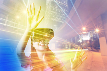 Double exposure of happy woman using VR-headset glasses for virtual reality concept
