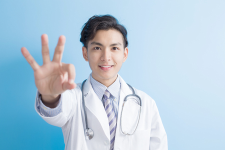 male doctor show ok to you,asianの写真素材