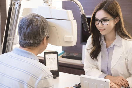 old man with optometrist in the store