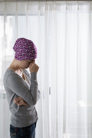 poor cancer woman feel bad at homeの写真素材
