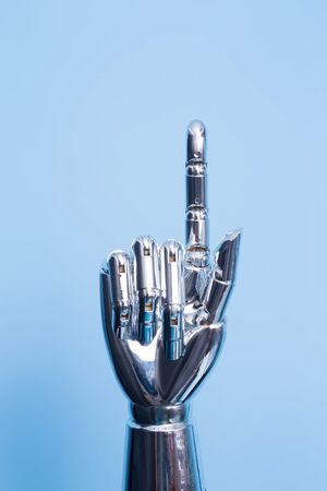 robot hand show something on the blue backgroundの写真素材