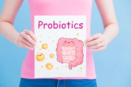 woman take probiotics billboard on the blue backgroundの写真素材