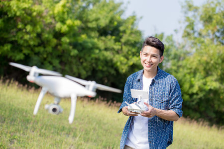 asia man play drone in the outdoor