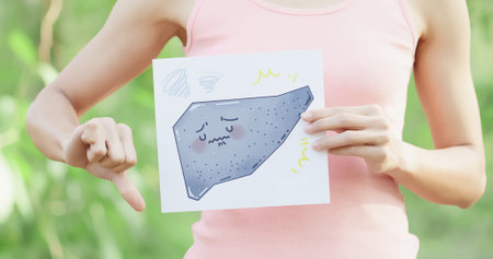 woman take cirrhosis liver billboard with green backgroundの写真素材