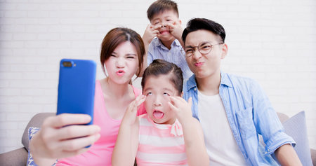 Family take phone and selfie funny at home
