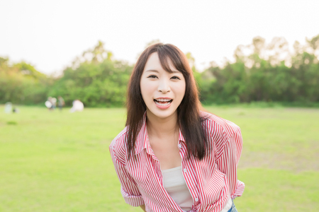 beauty woman smile happily on the outdoorの写真素材