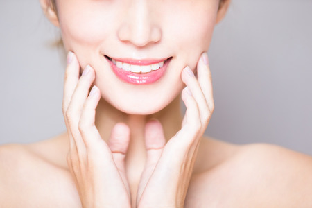 close up of beauty woman tooth on the gray backgroundの写真素材